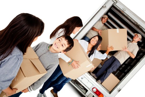 Removal van and movers handling a Chelsea property move