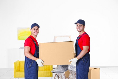 Removal team planning a move in a Chelsea street