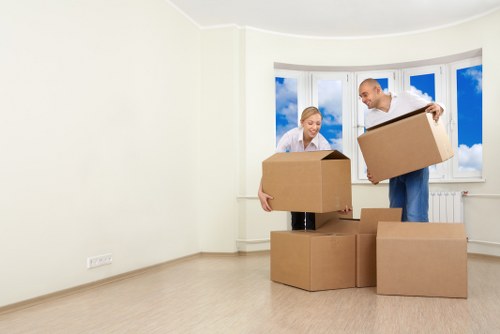Furniture being carried from a Chelsea home for transport