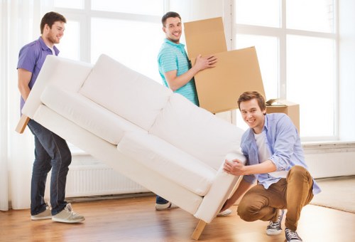 Local moving team handling office furniture in Chelsea