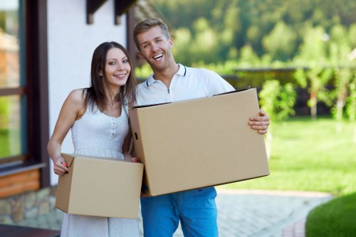 Packing and loading furniture into a moving van in Chelsea