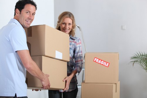 Local moving truck loading furniture in Chelsea