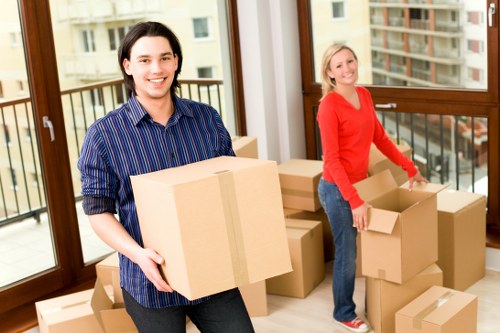 Loading furniture into a moving van in Chelsea