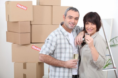 Careful loading of household items for transport in Chelsea