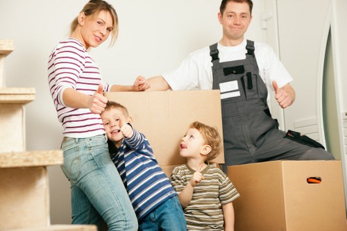 Packed boxes and moving supplies for a Chelsea home removal